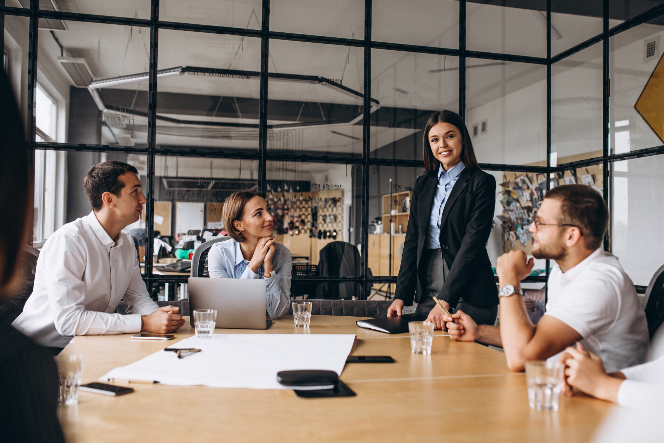 group of people working out business plan in an office